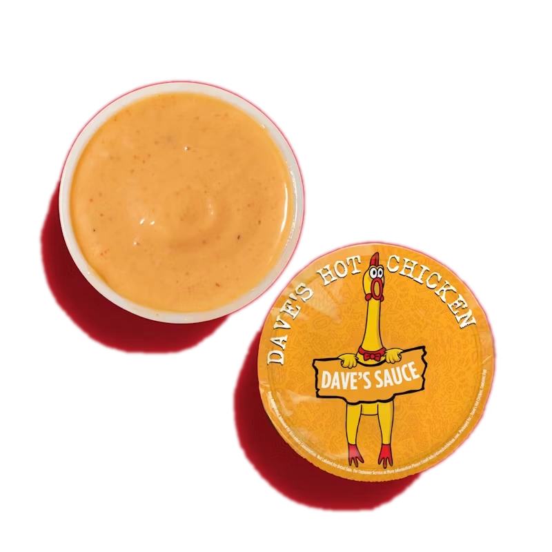 Side of Dave's Sauce Dipper with Dave's signature creamy sauce for chicken and fries